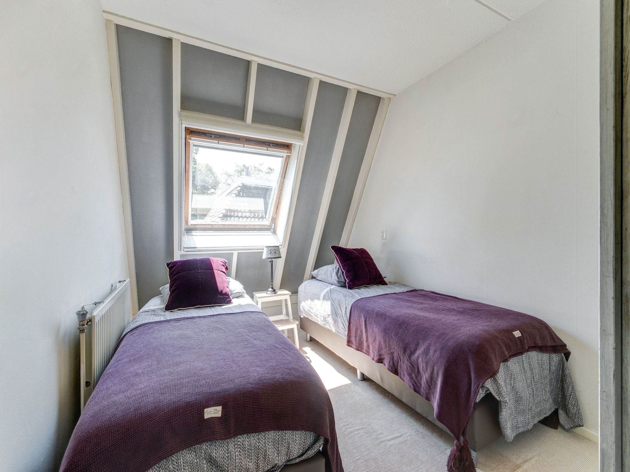 Een slaapkamer van Ruim appartement in centrum Leeuwarden in Leeuwarden