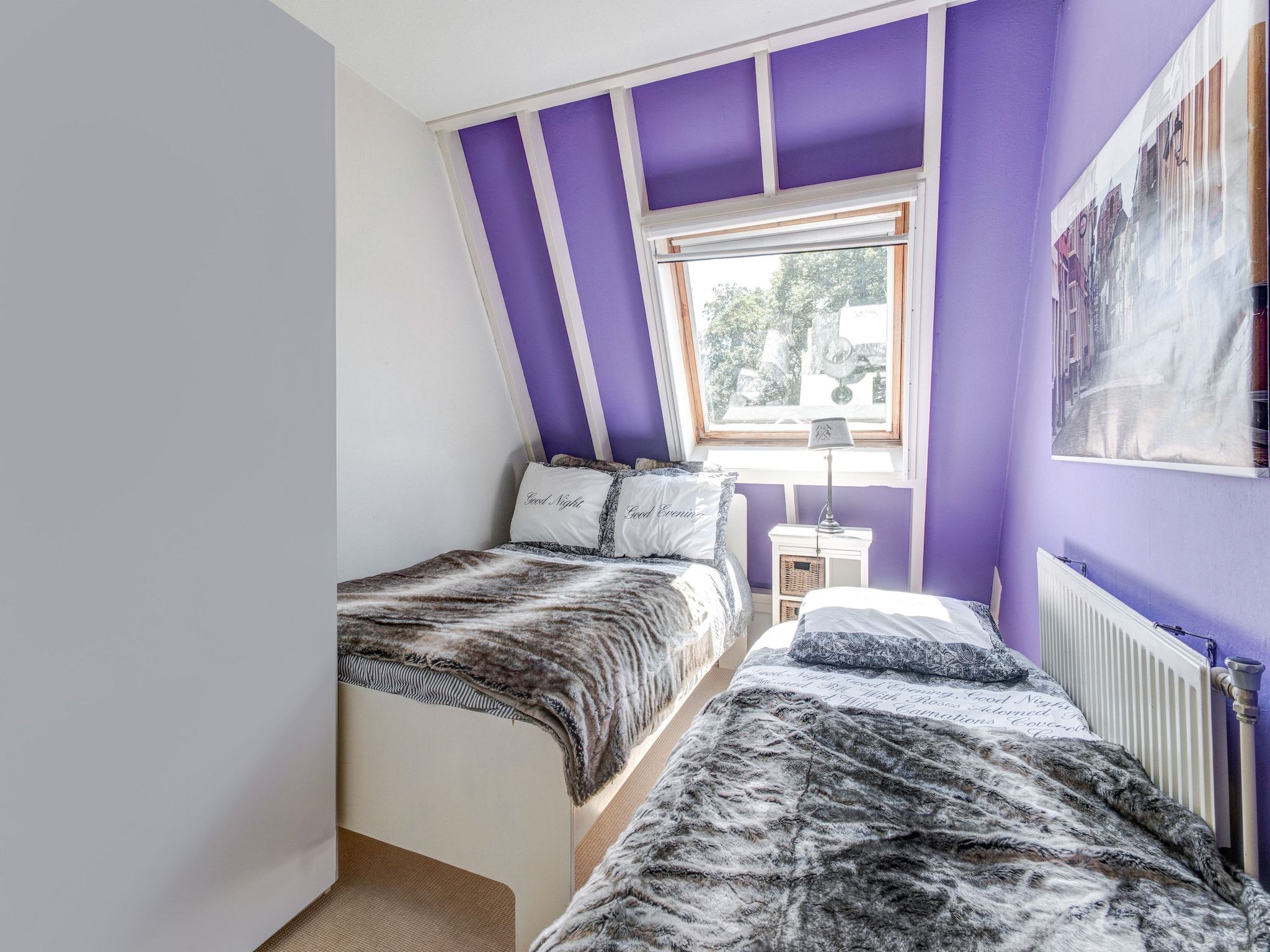 Een slaapkamer van Ruim appartement in centrum Leeuwarden in Leeuwarden