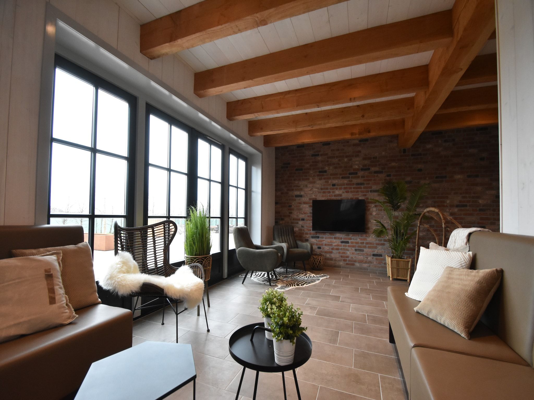 De woonkamer van Hazenborgh - Duinhuis 1 in Callantsoog