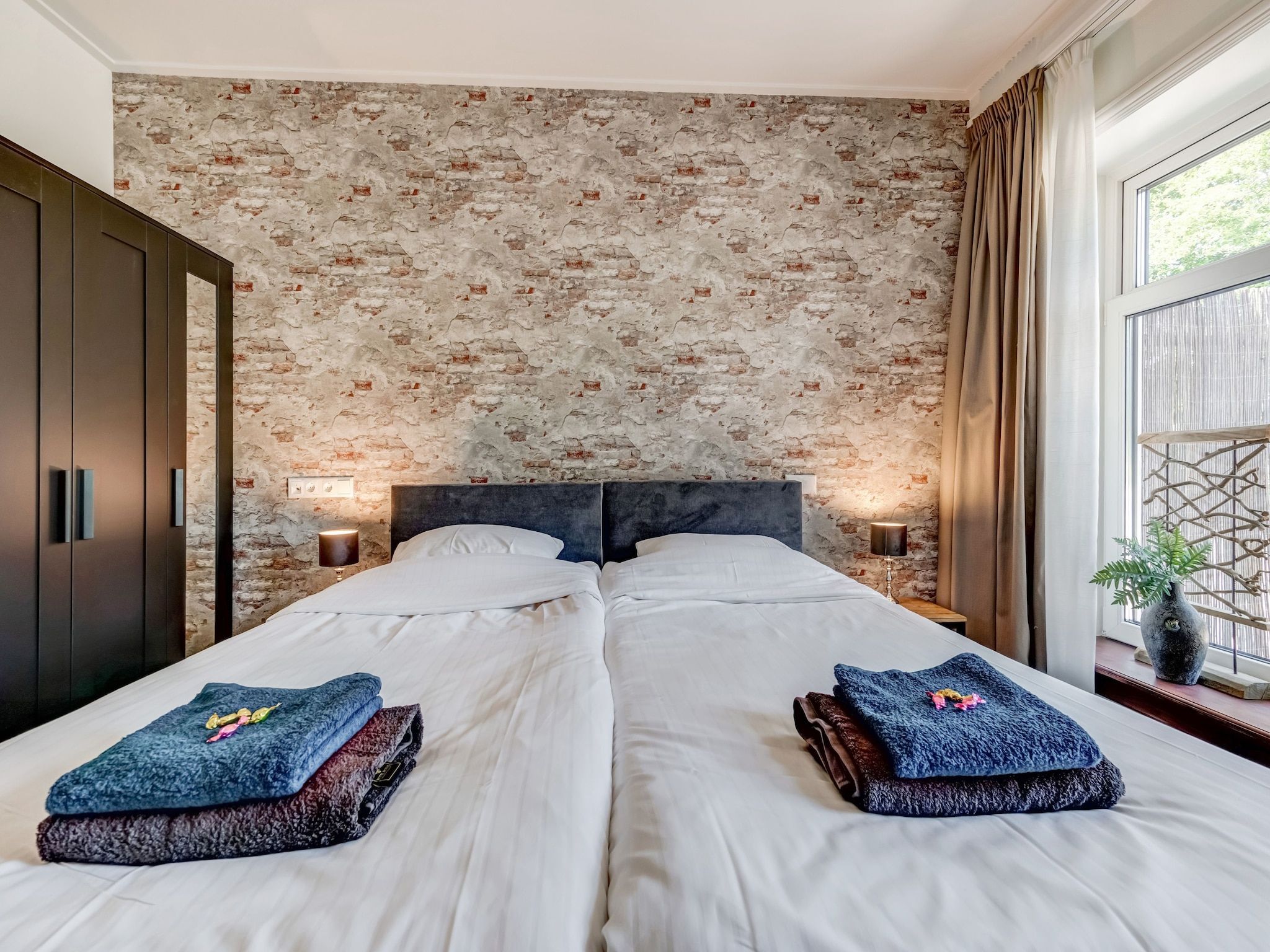 Een slaapkamer van Boerderij Koatstertille in Friesland