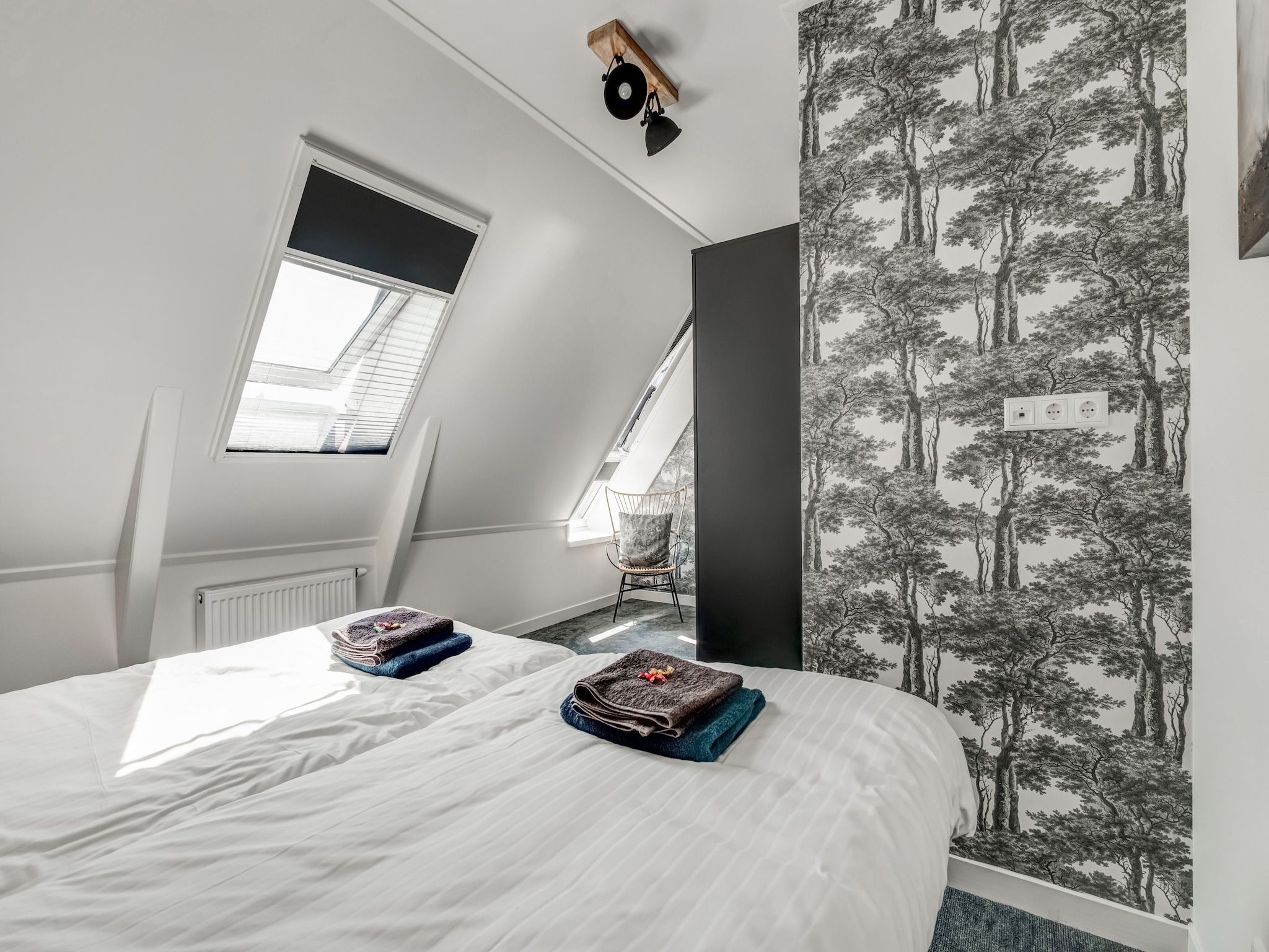 Een slaapkamer van Boerderij Koatstertille in Friesland