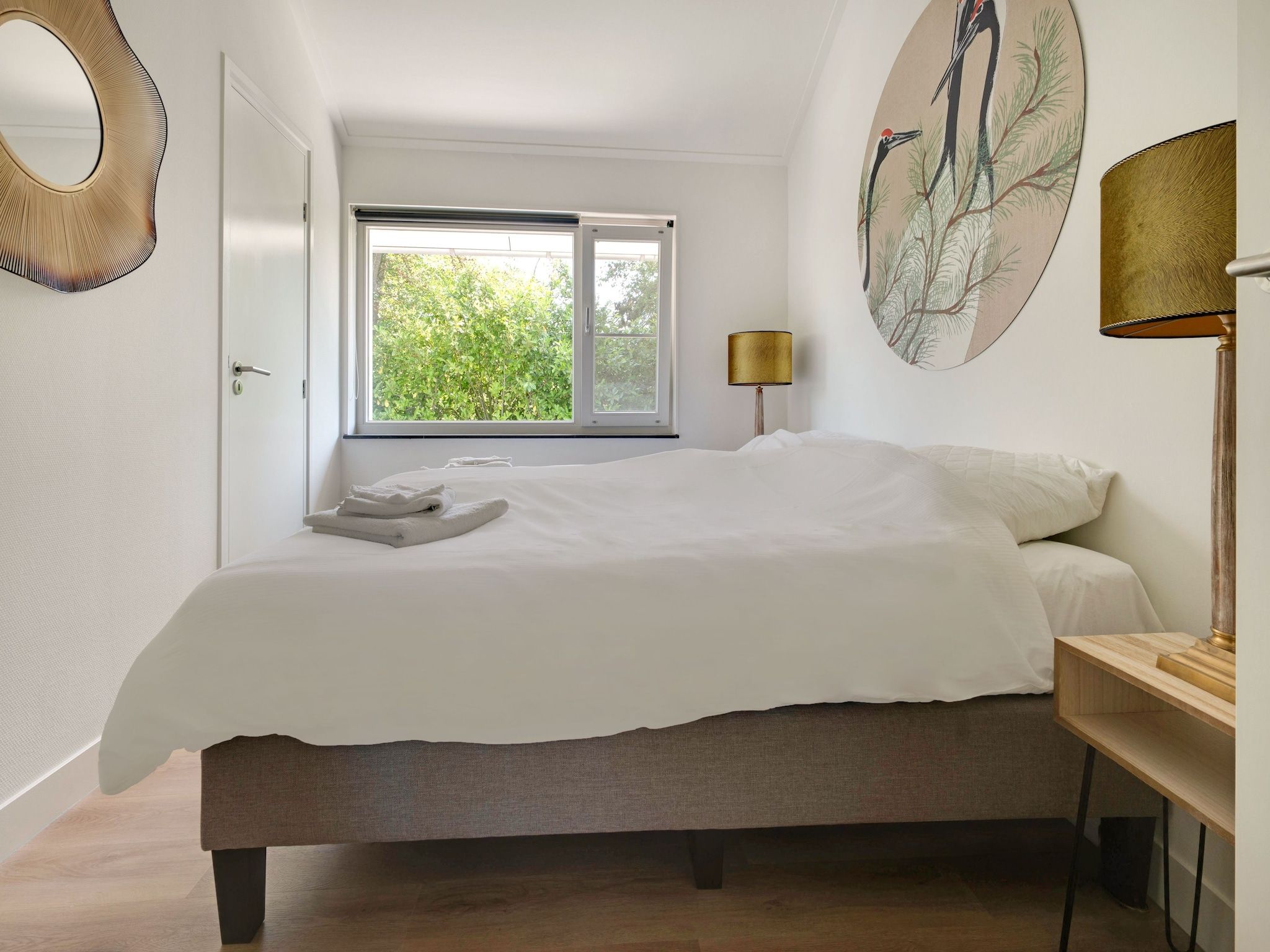 Een slaapkamer van Stijlvol familiehuis in Grou in Grou