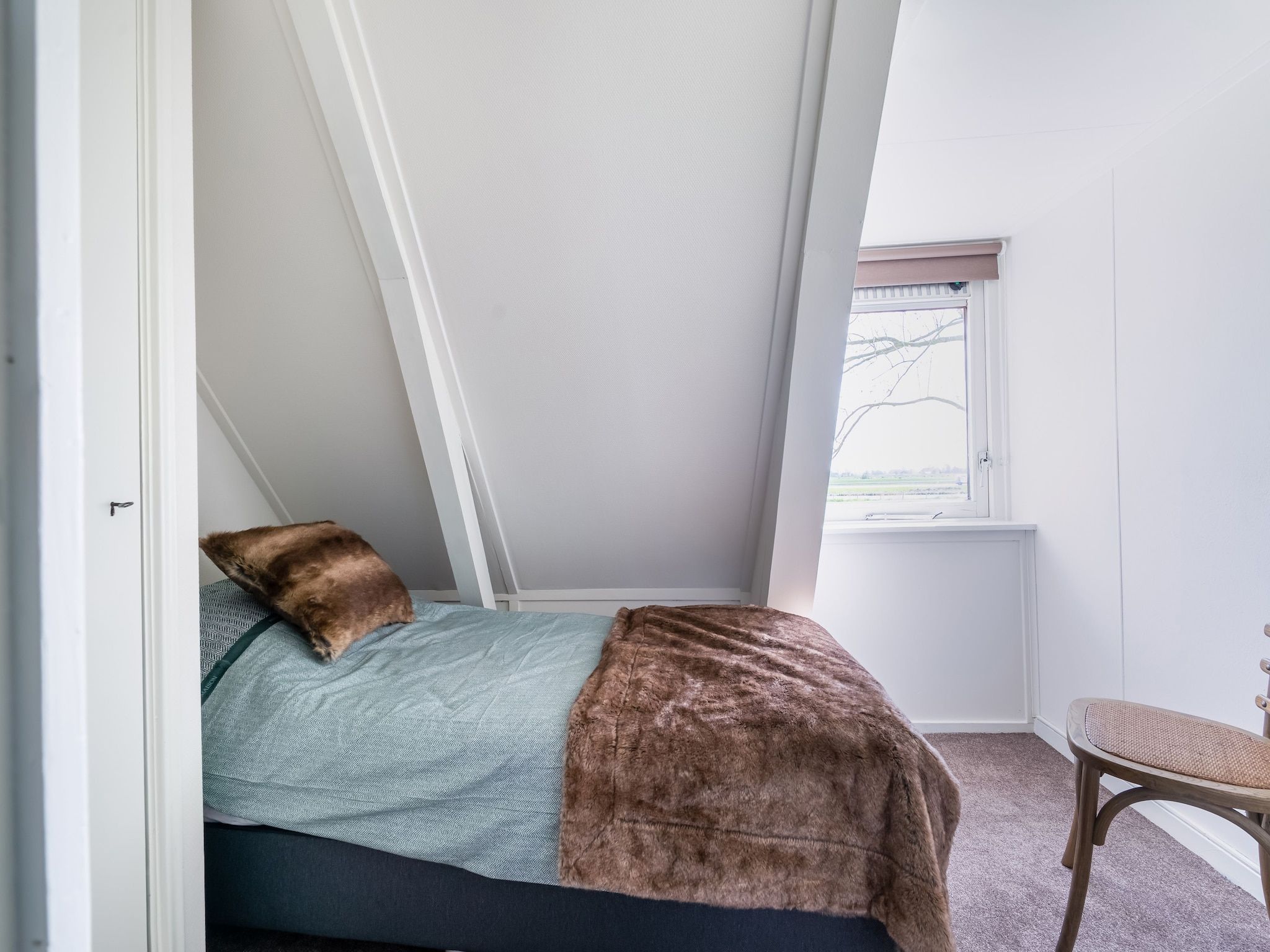 Een slaapkamer van B&B boerderij GRUTSK in Suwald