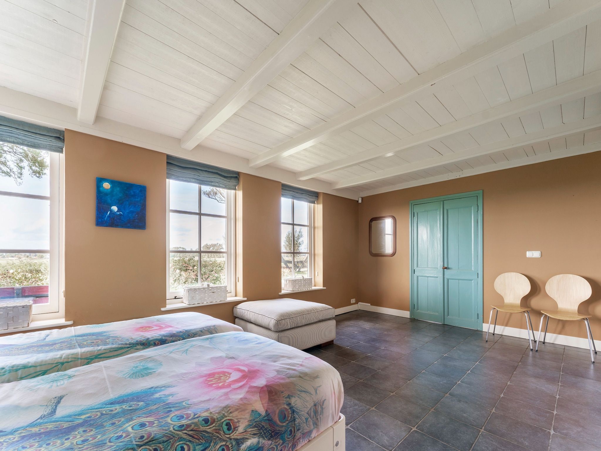 Een slaapkamer van De Pauwenhof in Heiloo