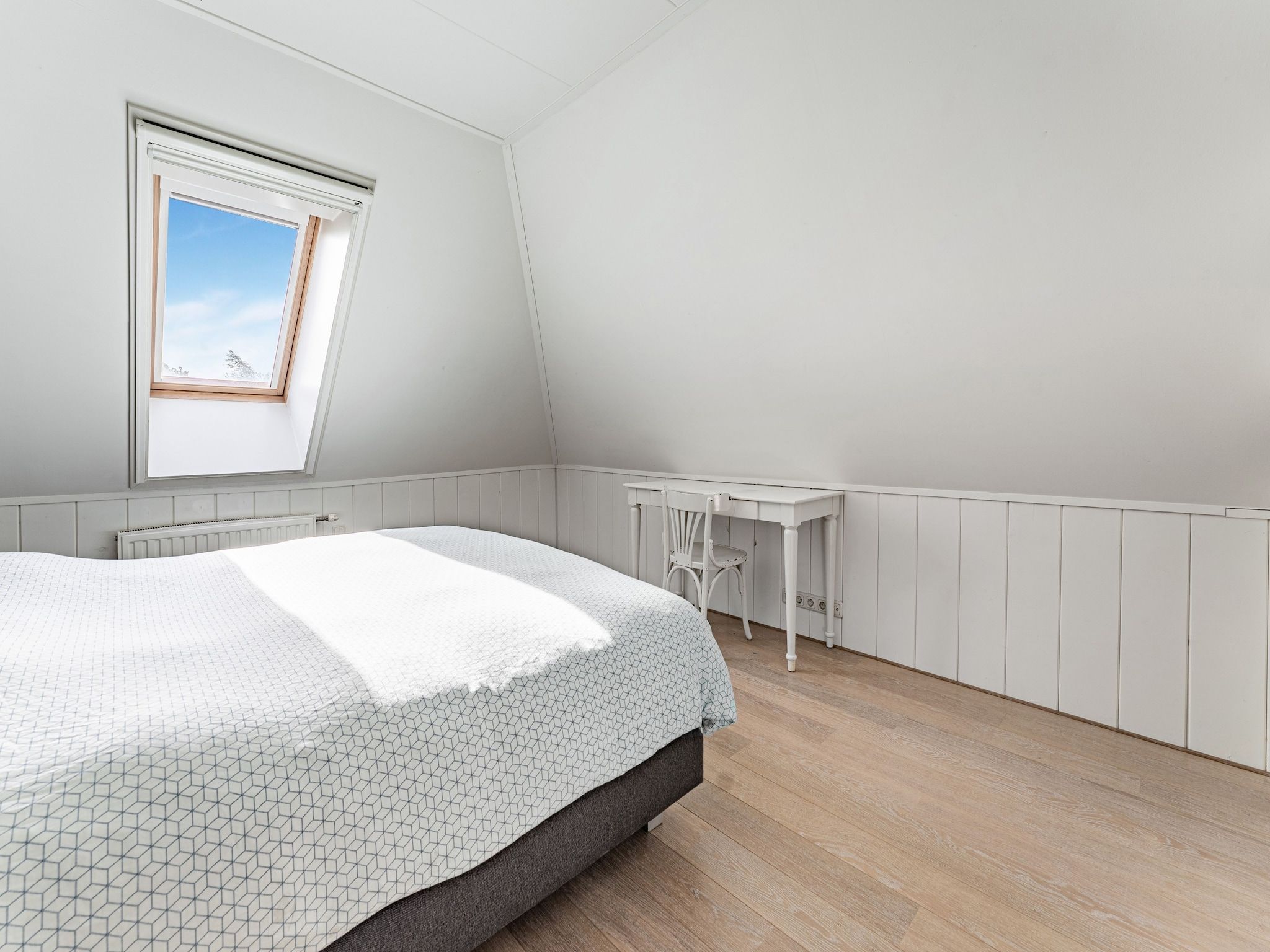 Een slaapkamer van De Pauwenhof in Heiloo