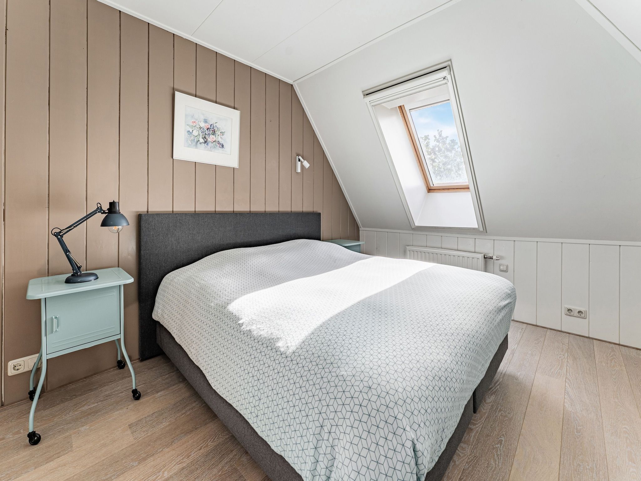 Een slaapkamer van De Pauwenhof in Heiloo