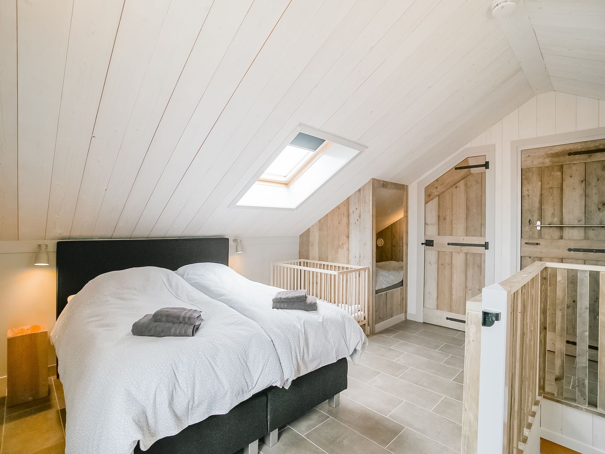 Een slaapkamer van Hazenborgh - Duinhuis 2 in Callantsoog