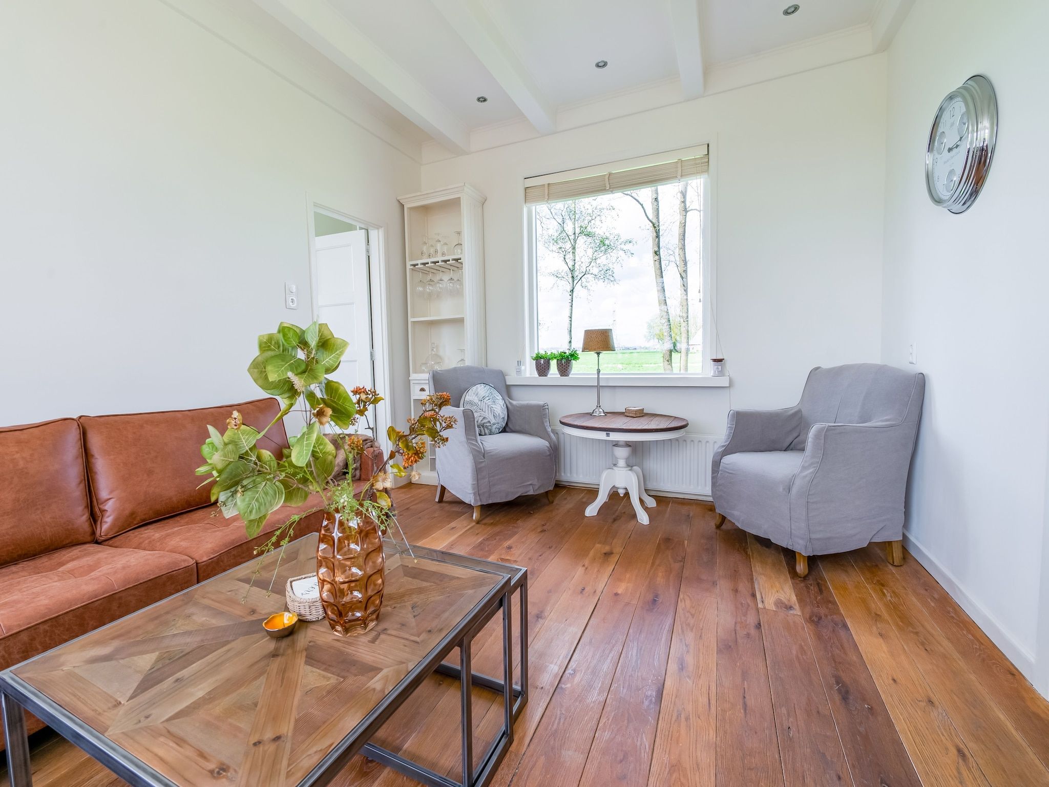 De woonkamer van Gezellige Boerderij met chalet in Friesland in Suwald