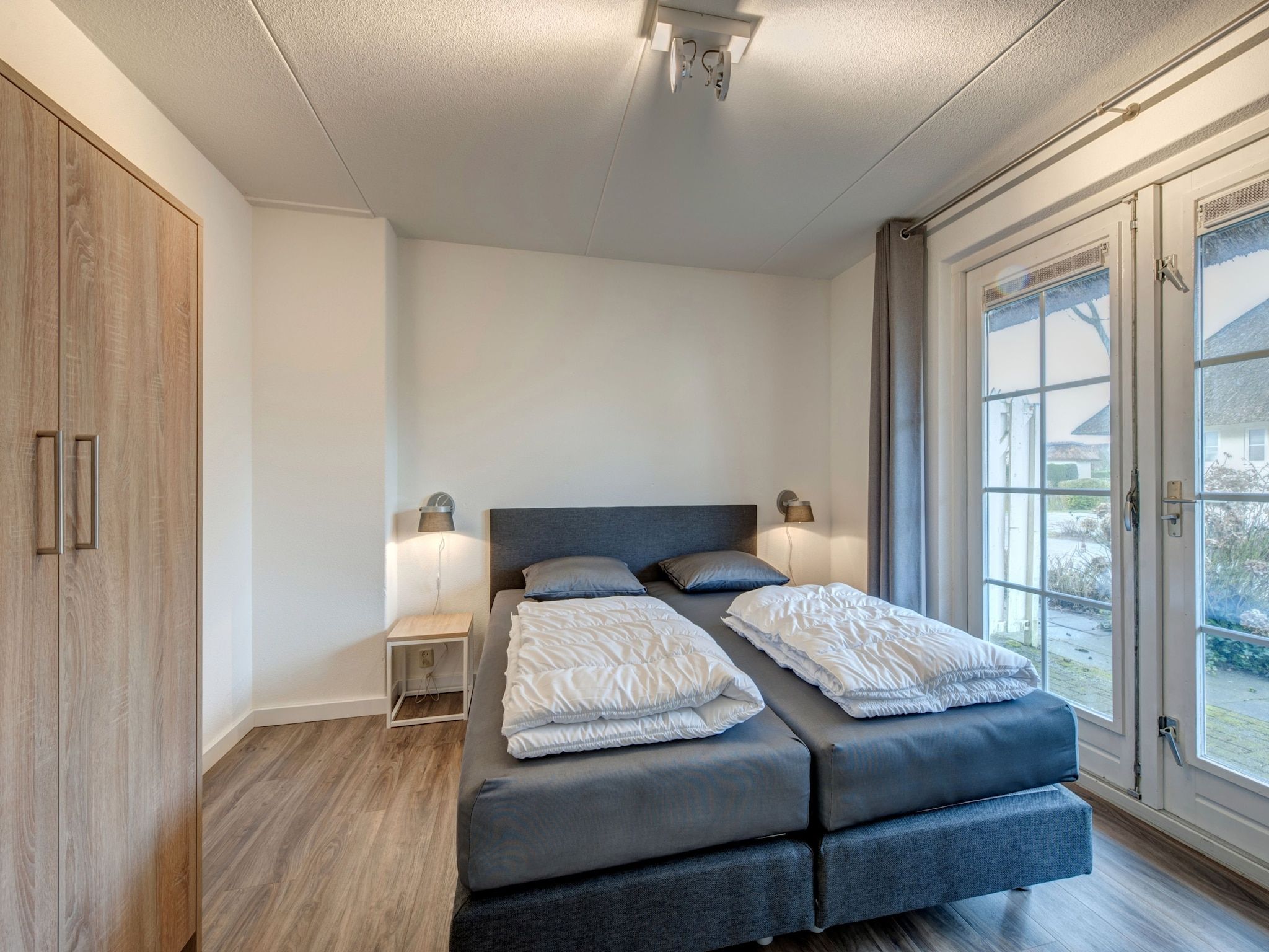 Een slaapkamer van Buitenhof Domburg  15 in Domburg