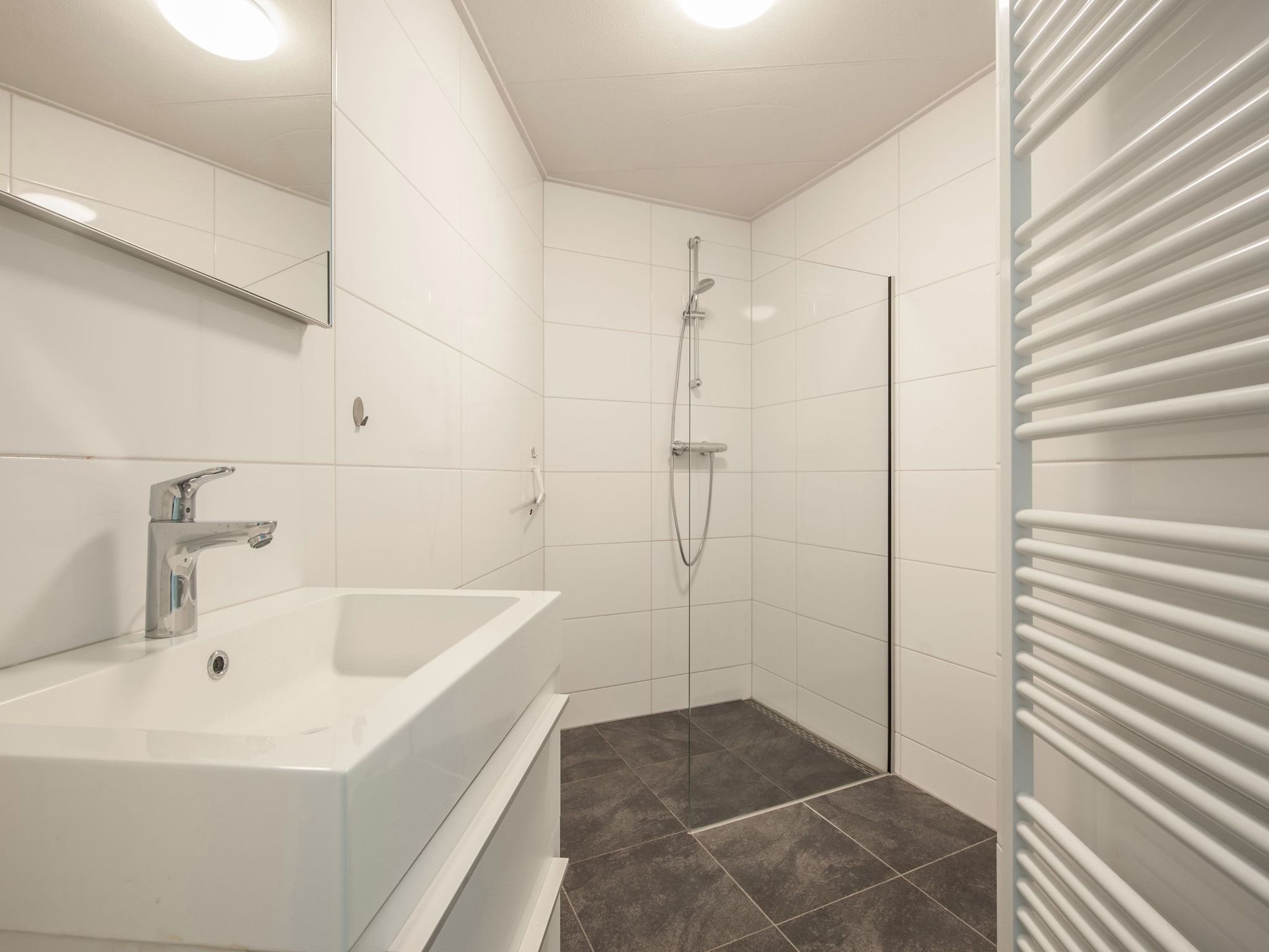 De badkamer van Vakantiepark Hof Domburg 26 in Domburg