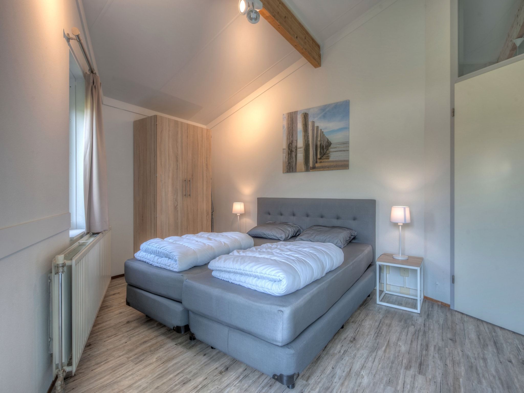 Een slaapkamer van Vakantiepark Hof Domburg 26 in Domburg