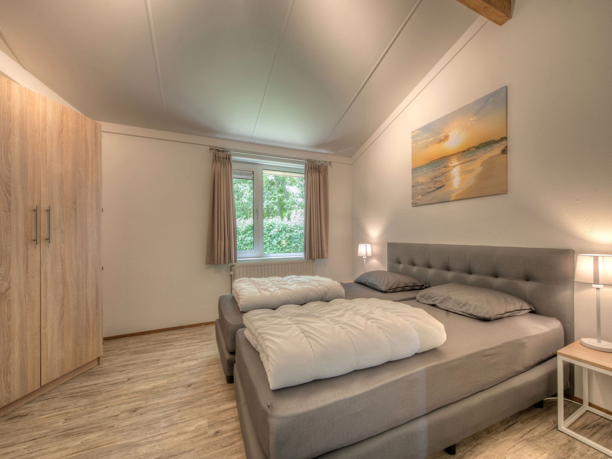 Een slaapkamer van Vakantiepark Hof Domburg 26 in Domburg