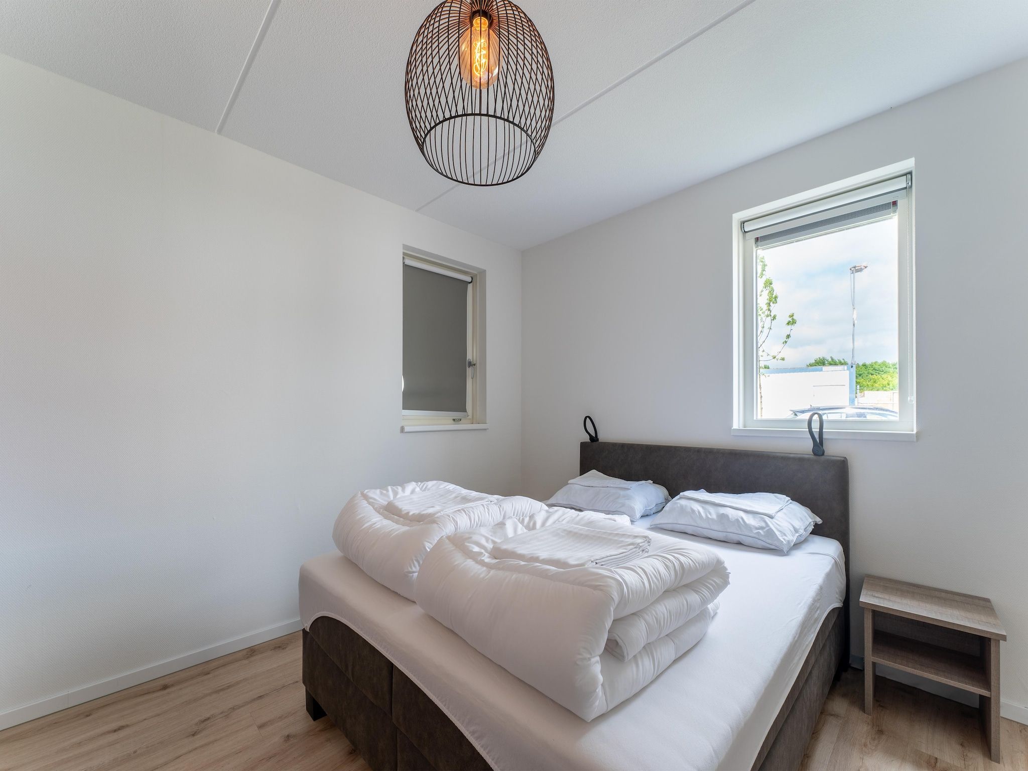 Een slaapkamer van De Scholekster Huis Nr 14 in Scherpenisse