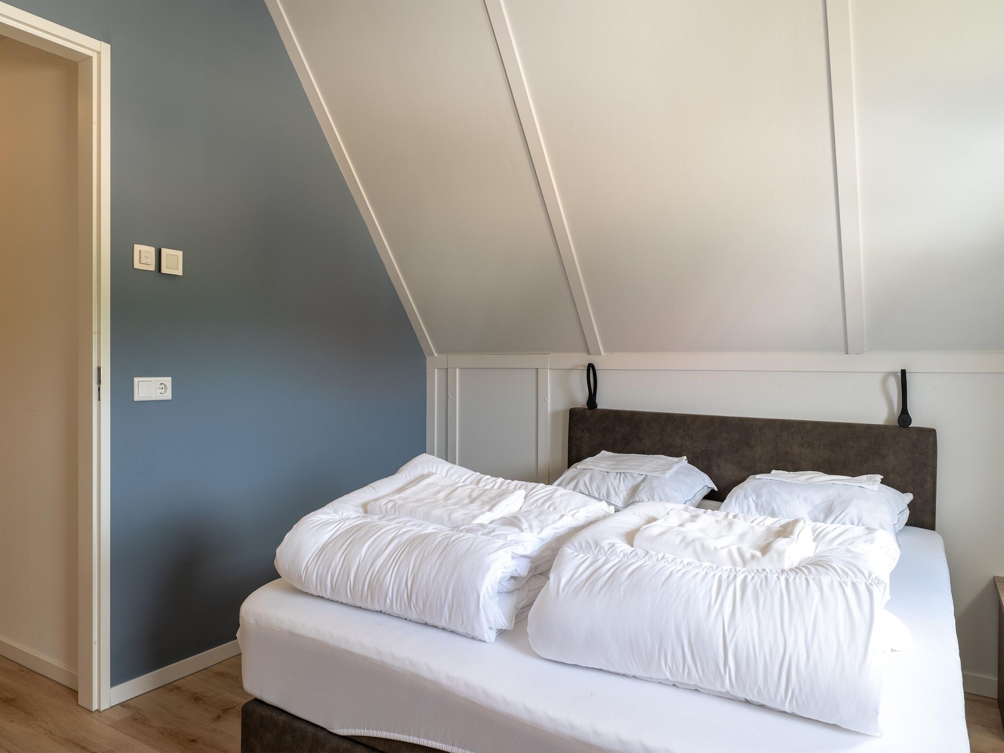 Een slaapkamer van De Scholekster Huis Nr 14 in Scherpenisse