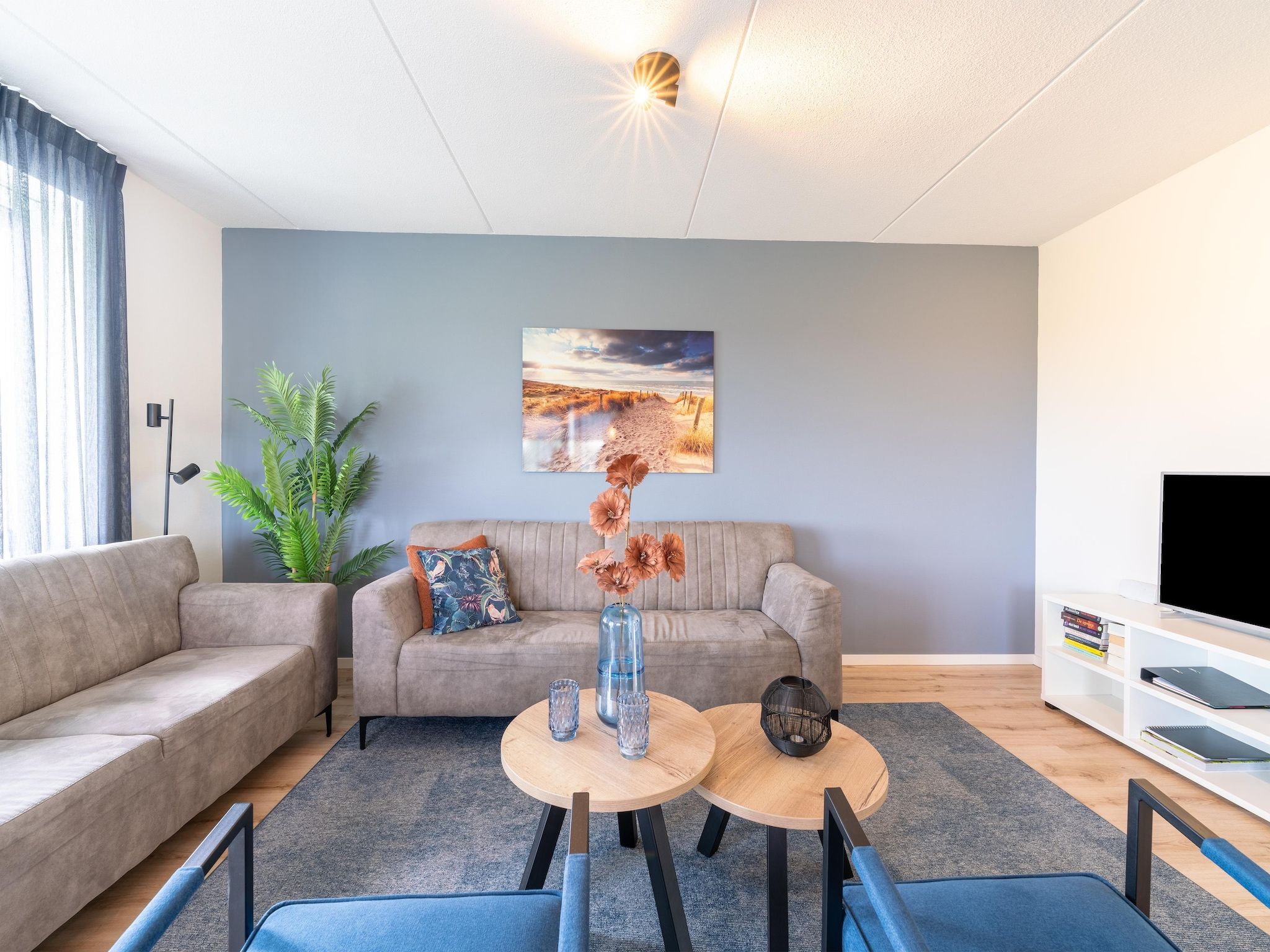 De woonkamer van De Kluut Huis Nr 12 in Scherpenisse