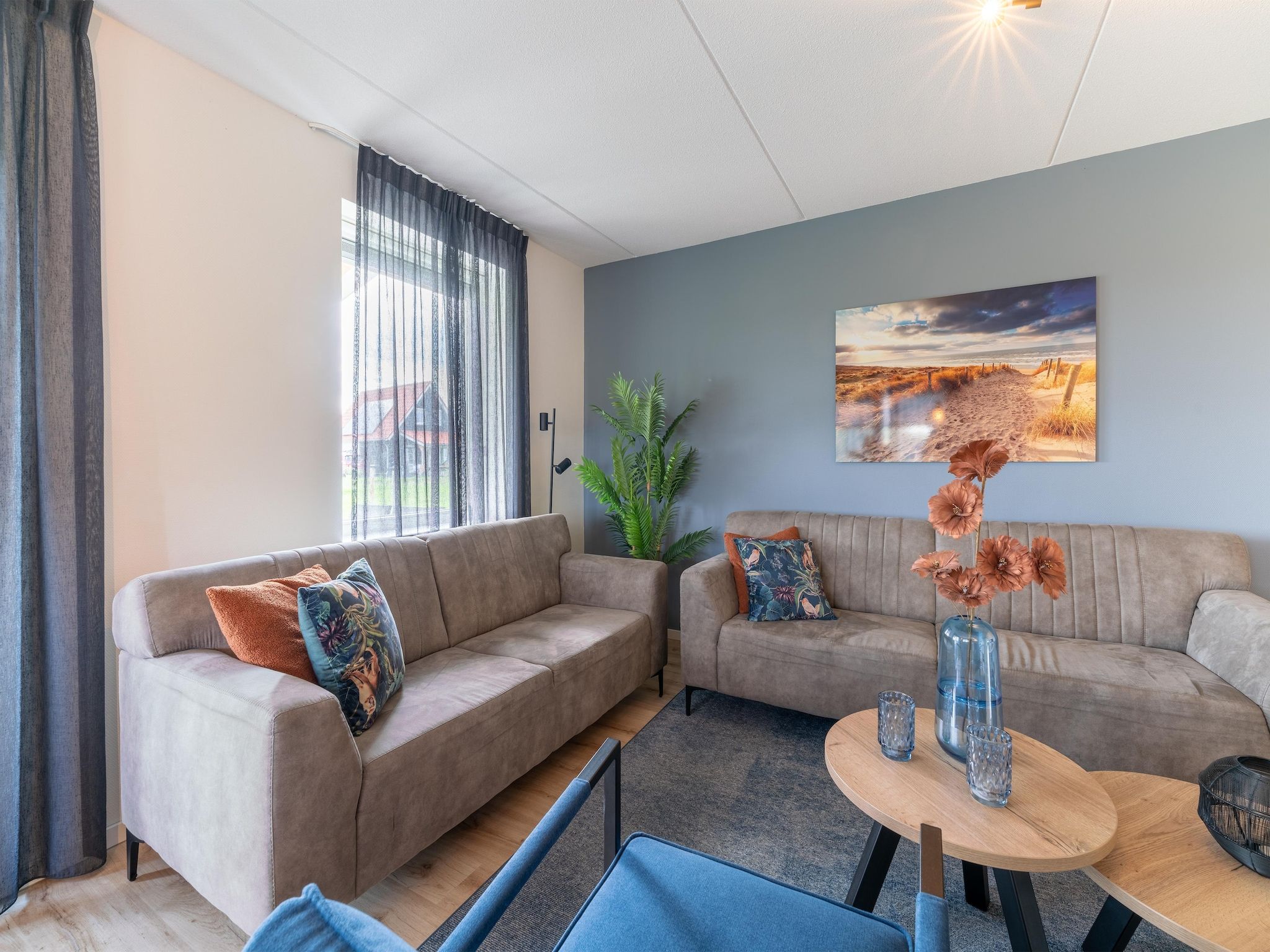 De woonkamer van De Kluut Huis Nr 12 in Scherpenisse