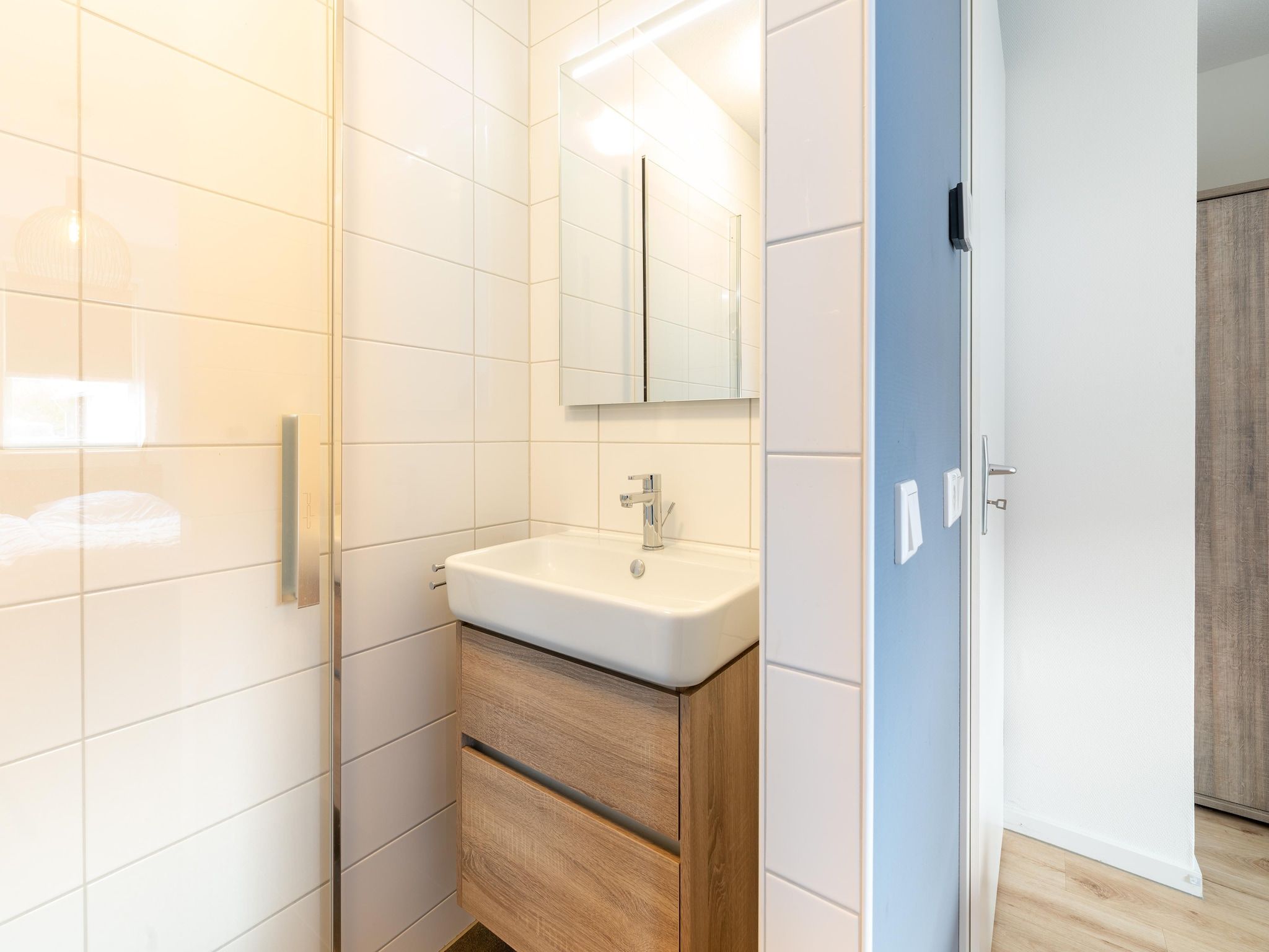 De badkamer van De Kluut Huis Nr 12 in Scherpenisse