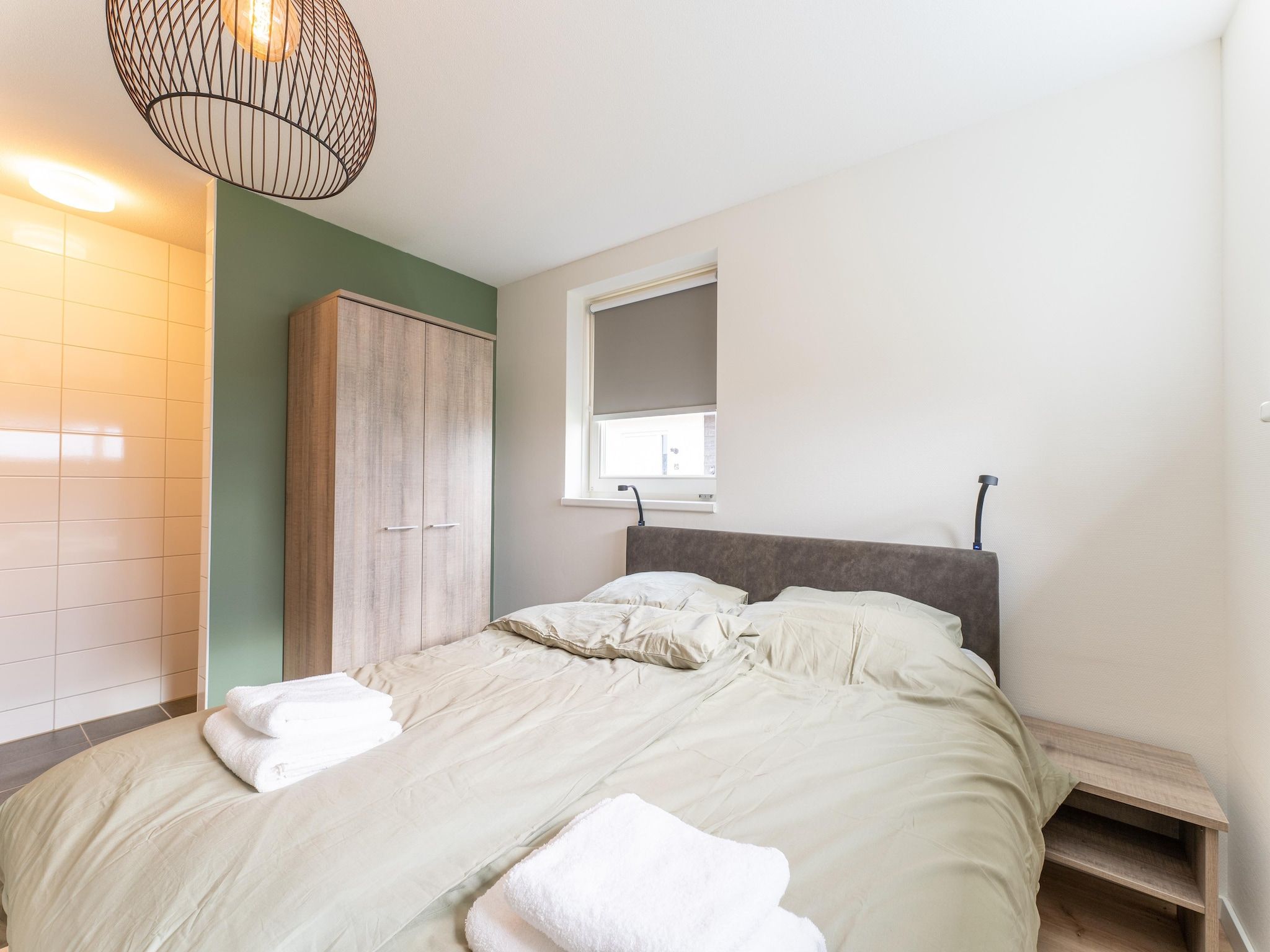 Een slaapkamer van De Reiger Huis Nr 46 in Scherpenisse