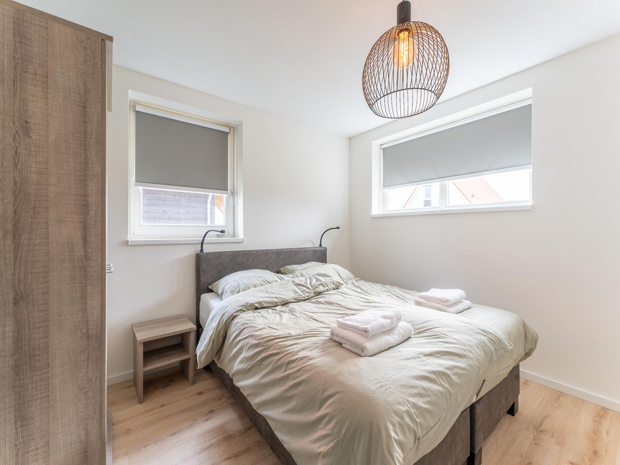 Een slaapkamer van De Reiger Huis Nr 46 in Scherpenisse