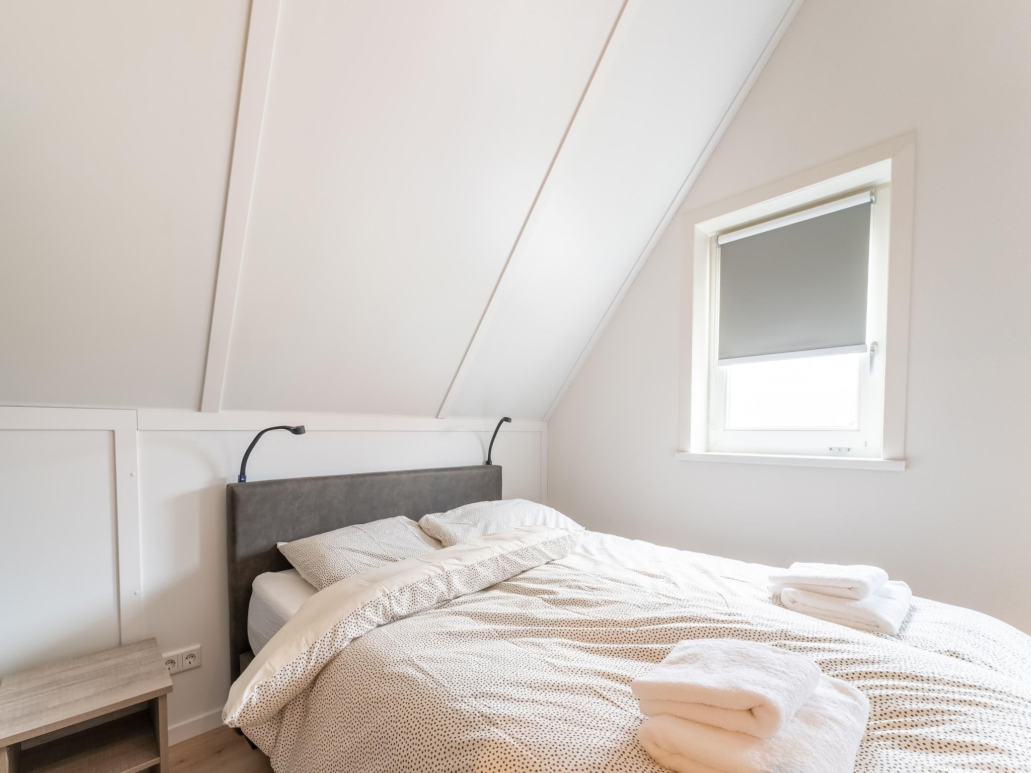 Een slaapkamer van De Reiger Huis Nr 46 in Scherpenisse