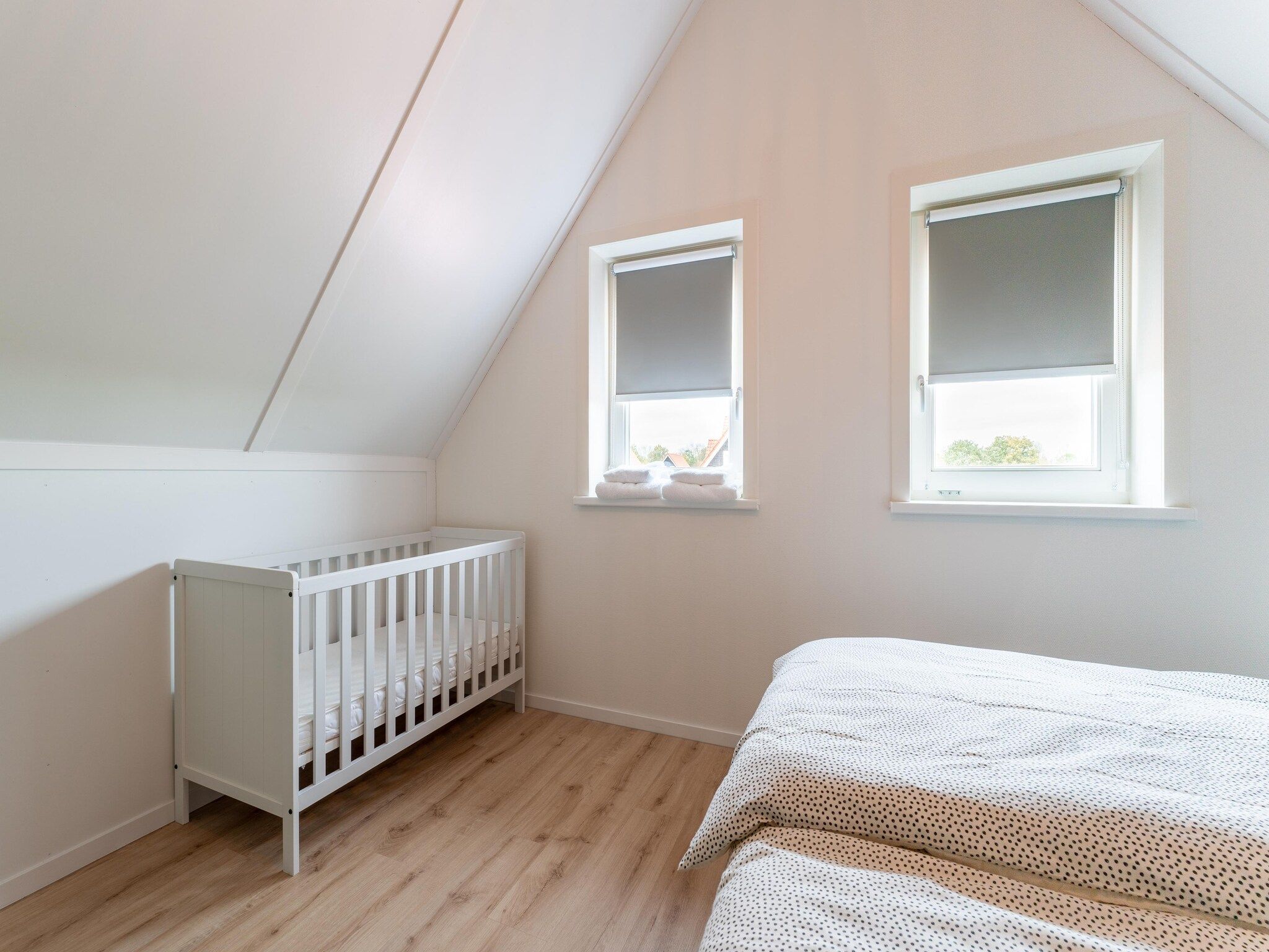 Een slaapkamer van De Reiger Huis Nr 46 in Scherpenisse