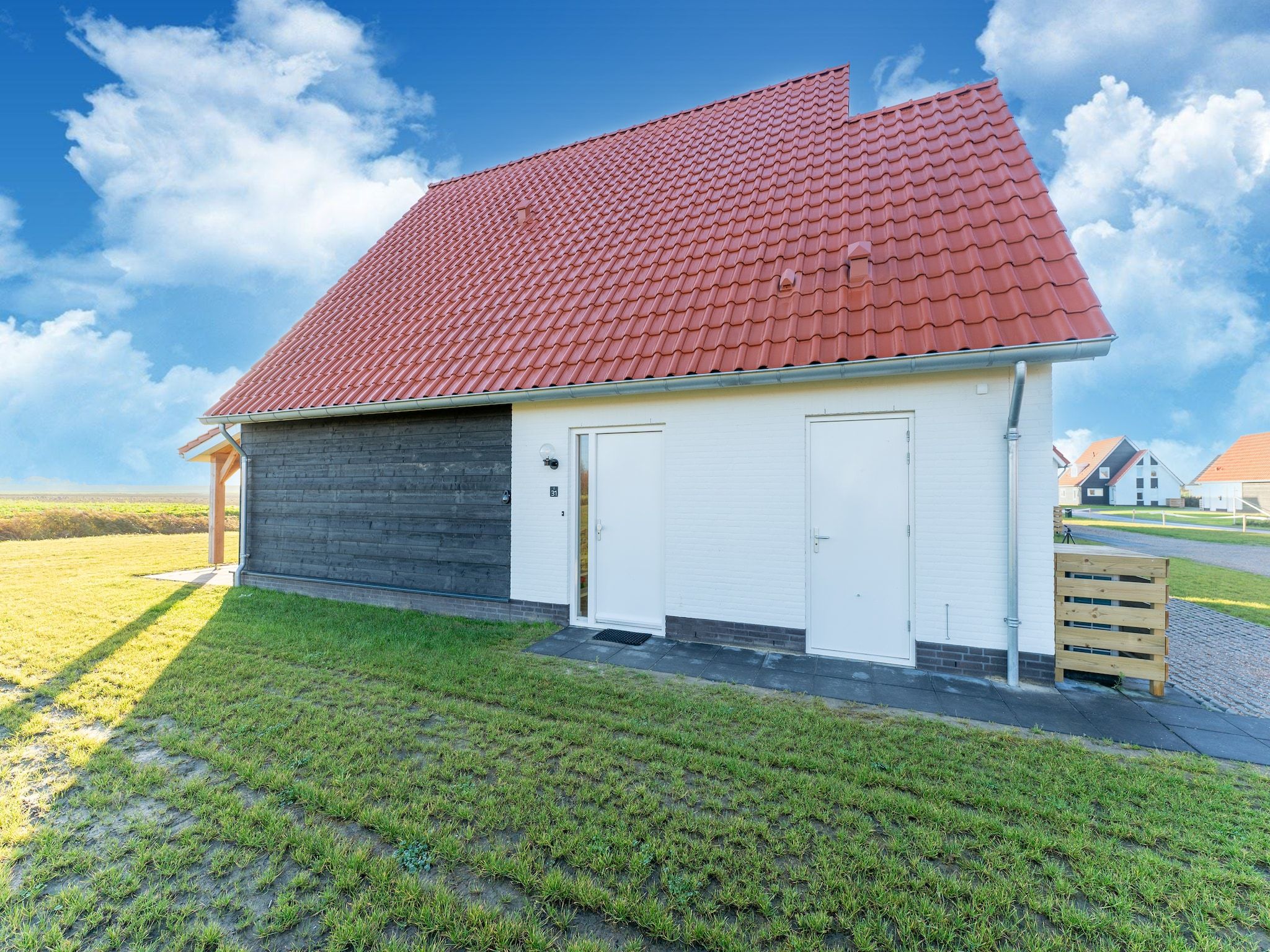 De tuin van De Roodborst Huis Nr 31 in Scherpenisse