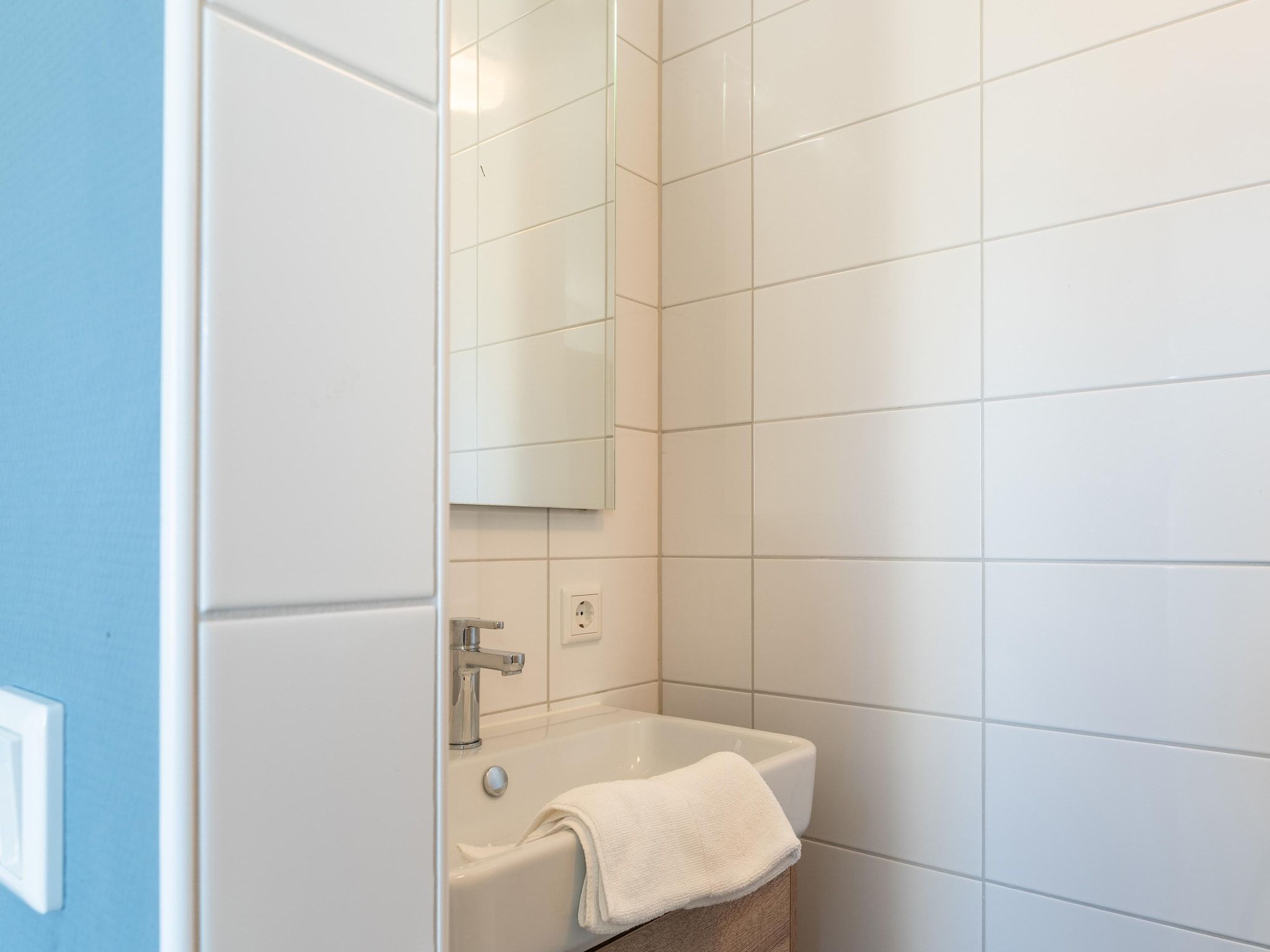 De badkamer van De Roodborst Huis Nr 31 in Scherpenisse