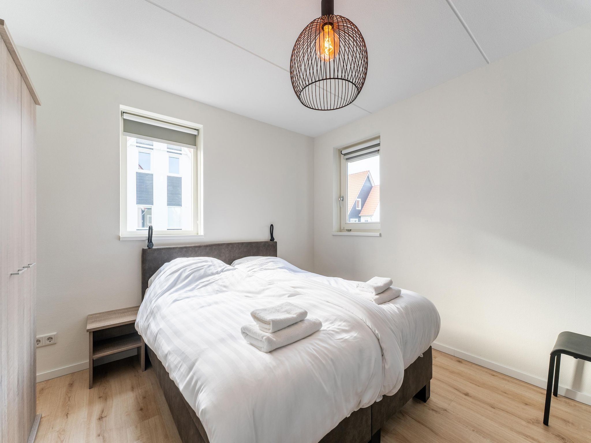 Een slaapkamer van De Pelikaan Huis Nr 45 in Scherpenisse