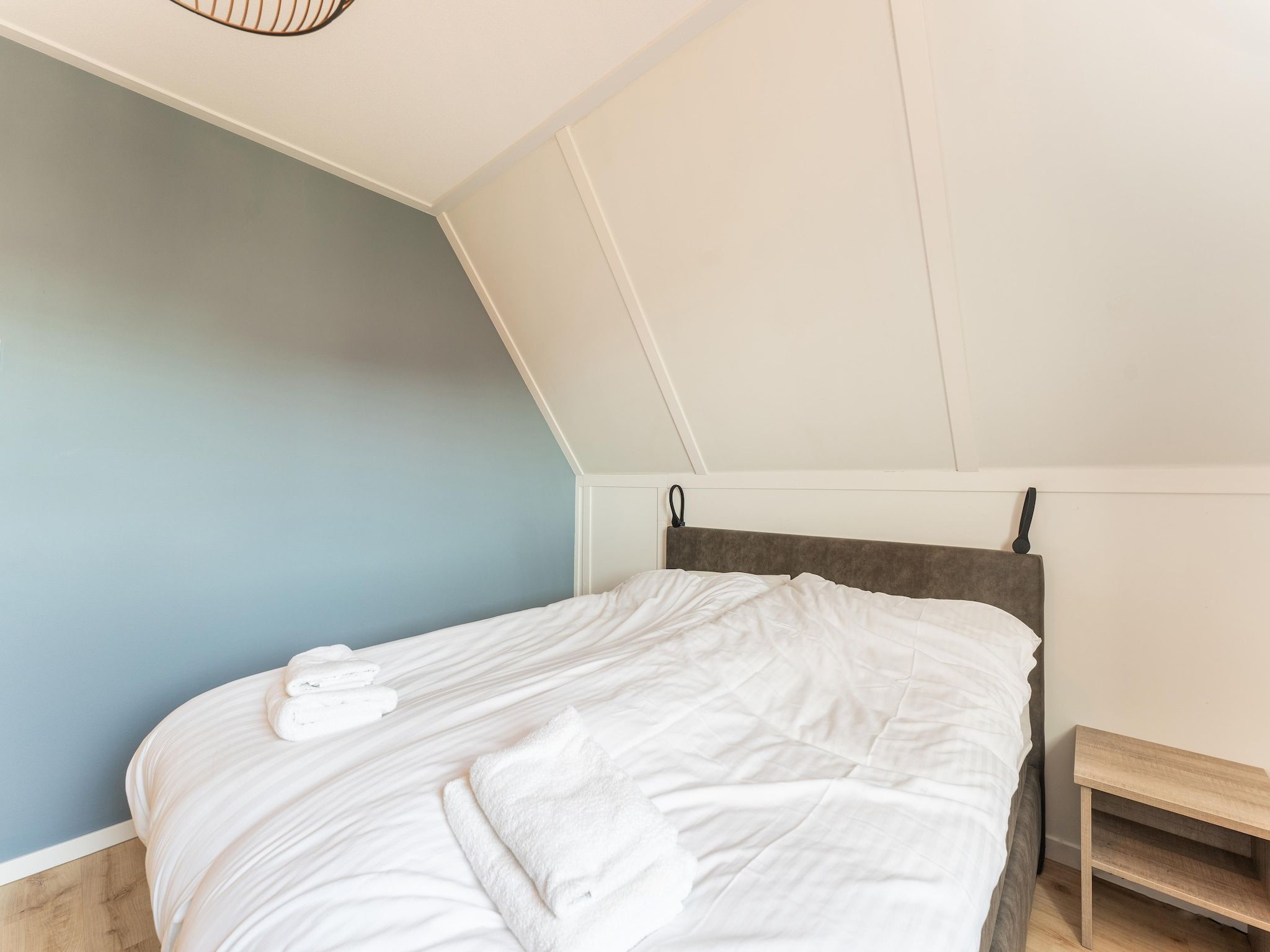 Een slaapkamer van De Pelikaan Huis Nr 45 in Scherpenisse