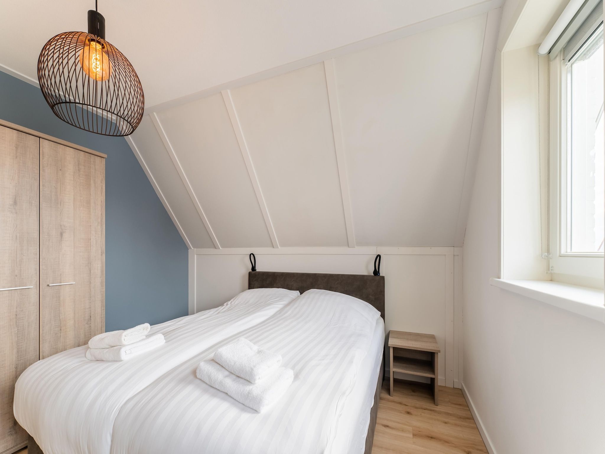 Een slaapkamer van De Pelikaan Huis Nr 45 in Scherpenisse