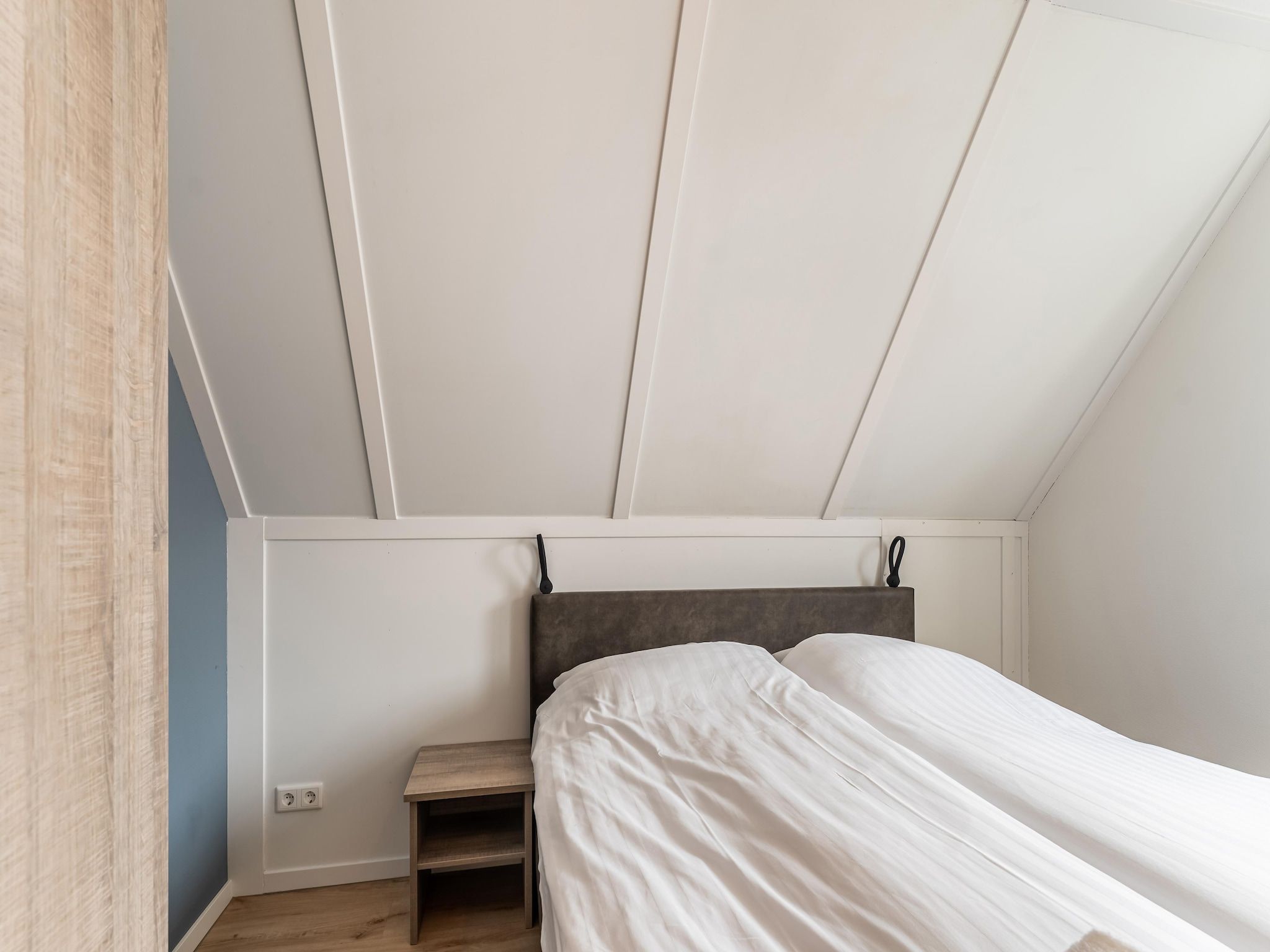 Een slaapkamer van De Pelikaan Huis Nr 45 in Scherpenisse