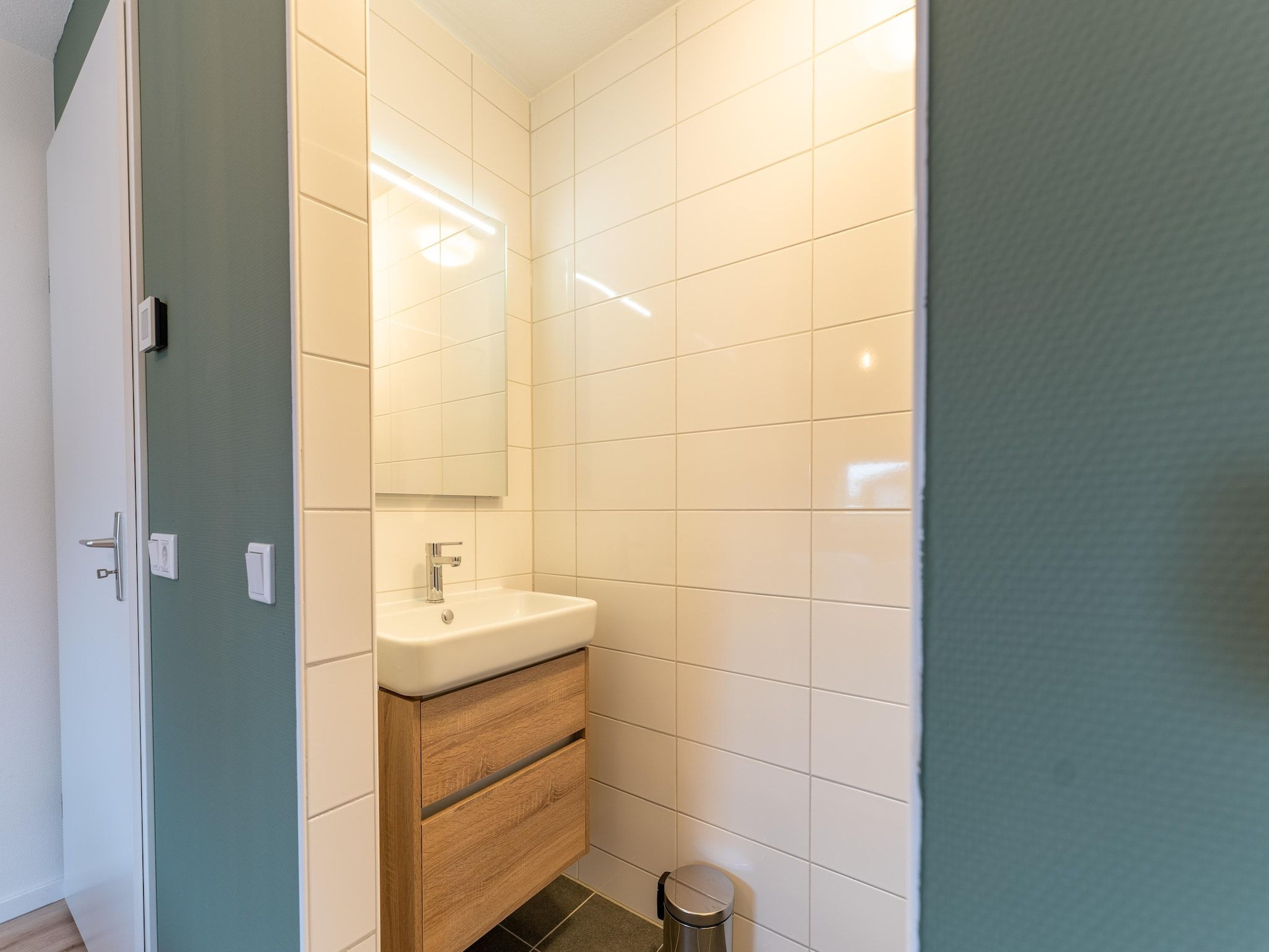 De badkamer van De Albatros Huis Nr 49 in Scherpenisse