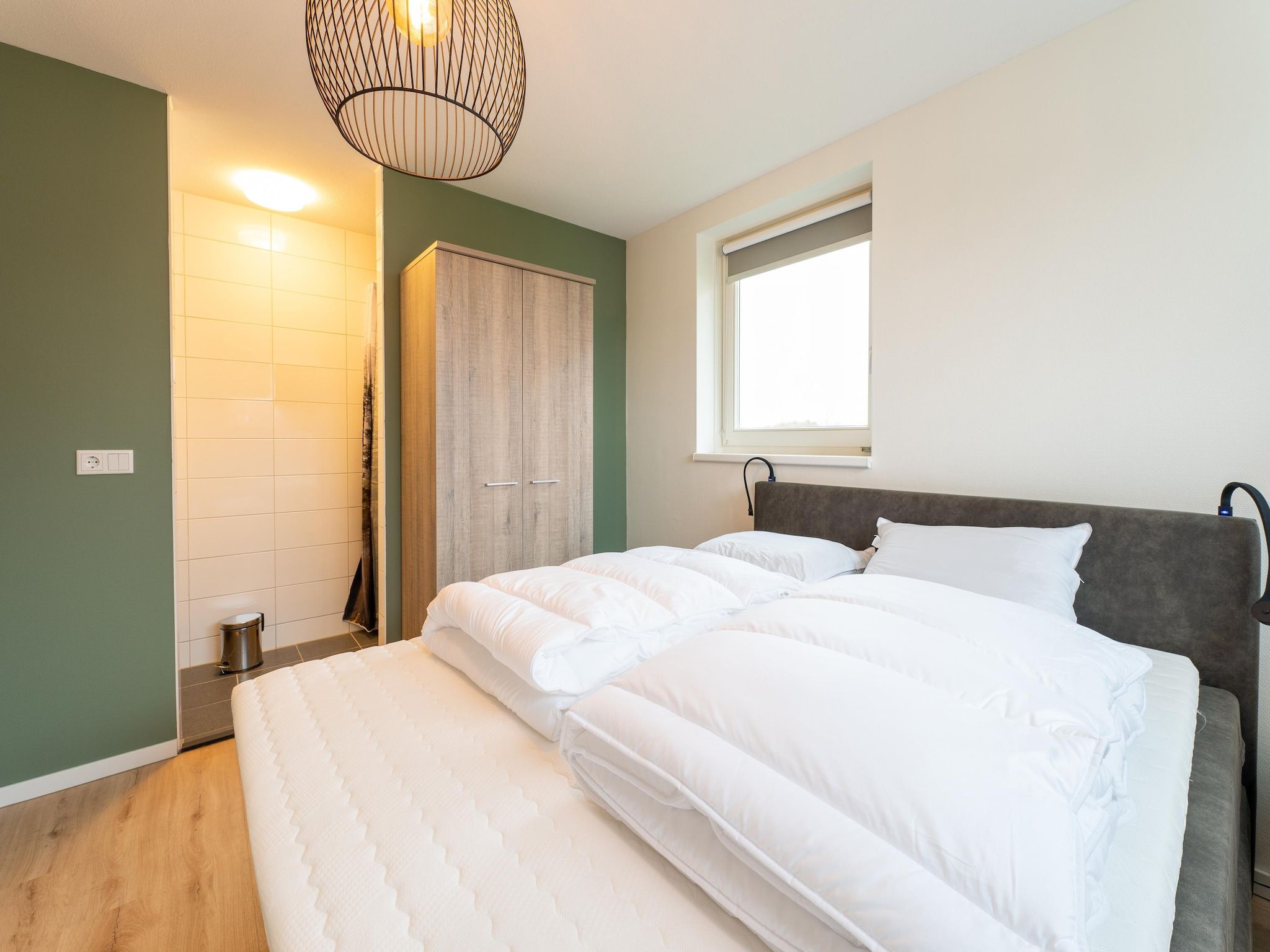 Een slaapkamer van De Albatros Huis Nr 49 in Scherpenisse