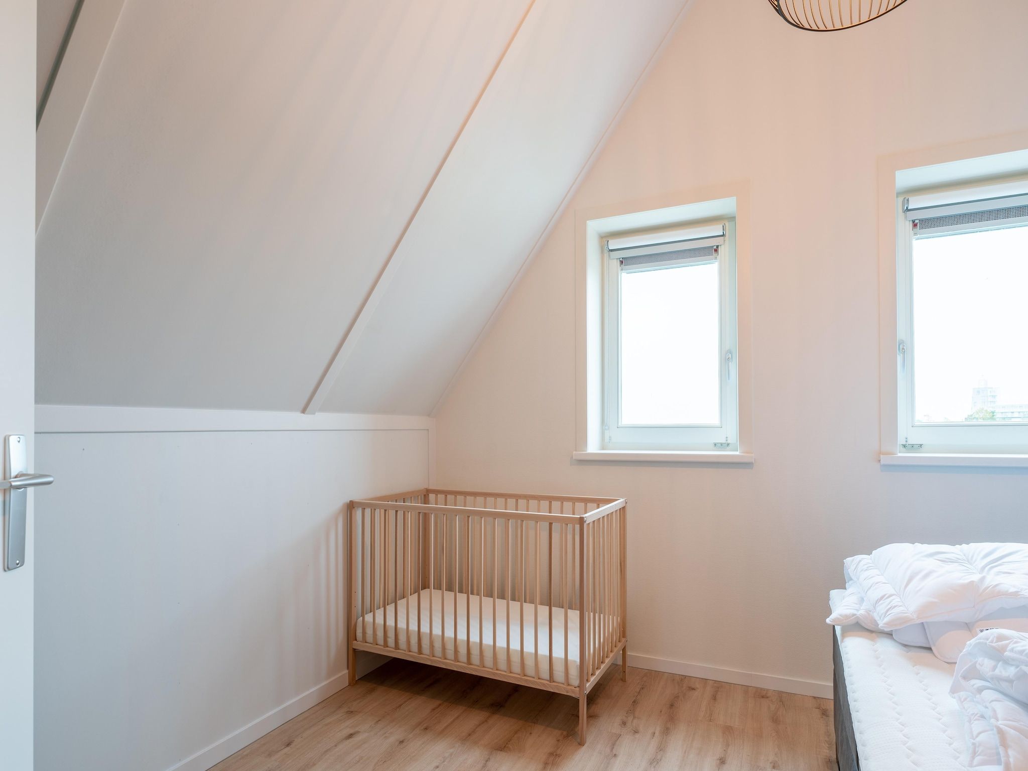 Een slaapkamer van De Albatros Huis Nr 49 in Scherpenisse