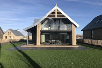 Villa Oesterdam Deluxe | 8 slaapplaatsen in Tholen