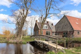 B&B-boerderij Grutsk in Suwald met privéhaven in Suwald