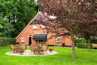 Mooi vakantiehuis met bubbelbad in Losser