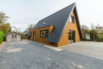 Moderne, nieuw ingerichte, vrijstaande villa voor 8 personen met een fijne grote tuin in Groote Keeten