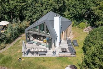 Sfeervolle 8 persoons villa met hottub bij bos in De Koog