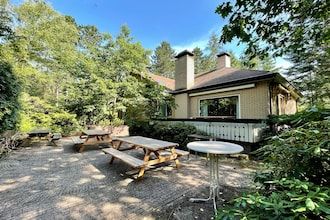 Villa van de Veluwe Edge Groep met vuurplaats in Doornspijk