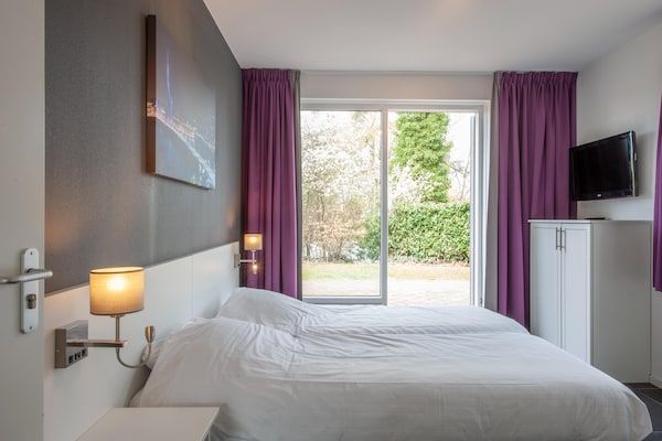 Slaapkamer - Villa in Arcen met Zwembad en Gezinsfaciliteiten in Arcen (4)
