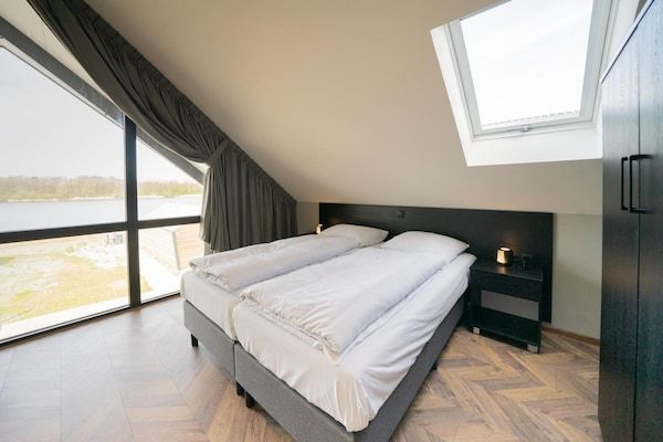Slaapkamer - Lakeview Villa Retreat voor 10 personen in Kampen (3)