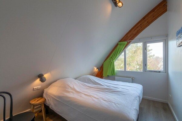 Slaapkamer - Kustvilla met jacuzzi in Groote Keeten (4)