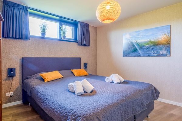 Slaapkamer - Moderne, luxe en duurzame natuurvilla in De Waal (5)